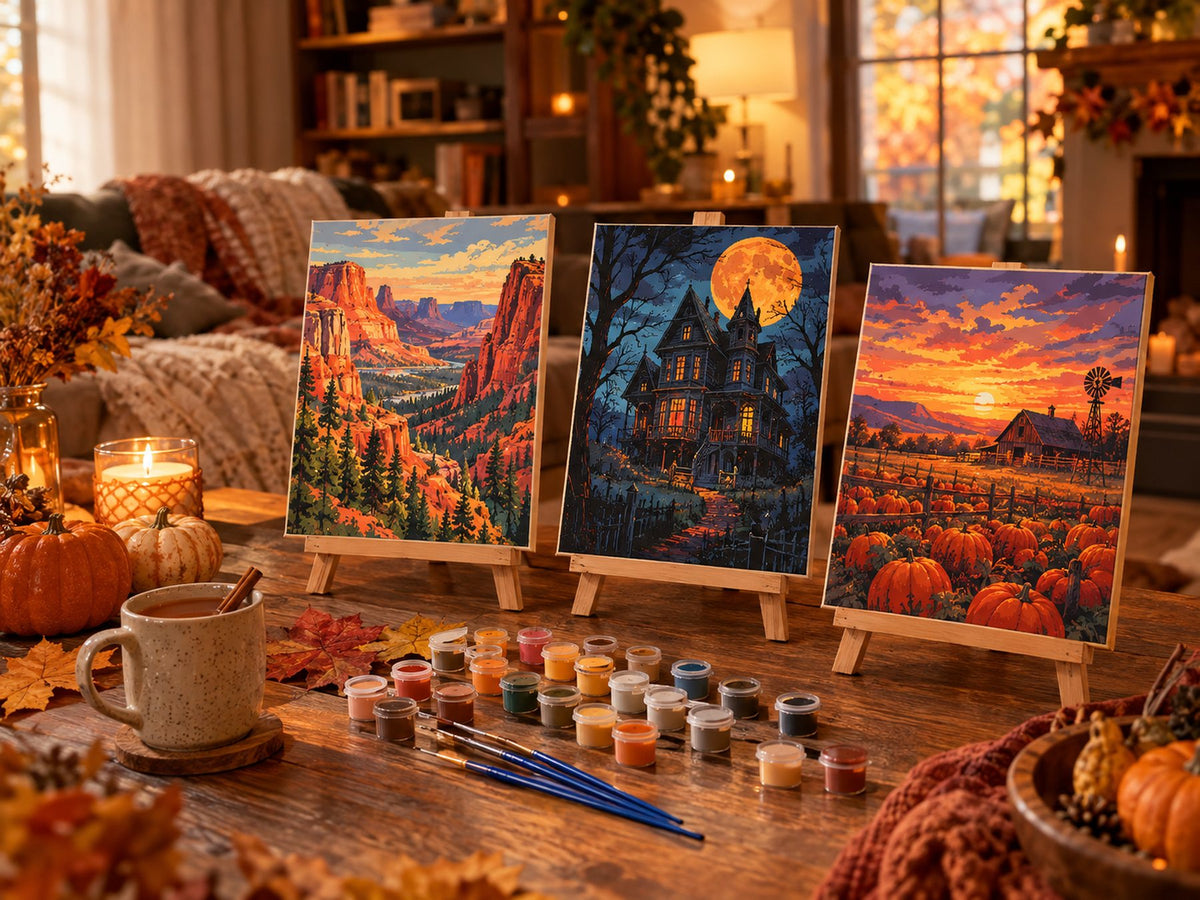 Finished paint by numbers kits on easels in a cozy autumn room